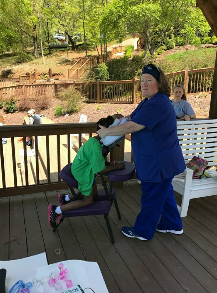 Kelly Buddenhagen | Chair Massage at 9th Retreat in Jasper | Thumbs Up Mission | Keaton Franklin Coker Foundation | Gainesville, GA